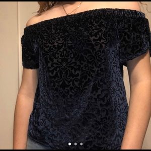 Off the shoulder navy blue velvet blouse.
